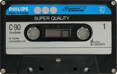 an old black and white cassette with the words super quality on it