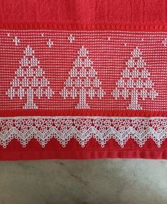 red and white lace with christmas trees on it