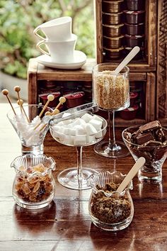 an assortment of desserts and pastries on a table