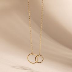 Mother and Daughter Necklace, Real Solid Gold Interlocking Circles Necklace, Gift For Mother, Happy Birthday Mother, Gift For Daughter This necklace represents an eternal bond between mother and daughter. 🎁 A meaningful gift for Mother's Day, mom's birthday, daughter's birthday or your daughter wedding day. ✅Gold Material: Real gold, genuine solid gold ✅Gold karat options: 14k or 18k gold ✅Gold color options: Yellow Gold, Rose Gold, and White Gold 📐DIMENSIONS Small Charm Necklace: small    * T Yellow Gold Circle Pendant Necklace Gift, Yellow Gold Necklace With Adjustable Chain For Anniversary Gift, Yellow Gold Necklace With Adjustable Chain For Anniversary, 14k Gold Open Circle Necklace For Gift, Minimalist Yellow Gold Necklace For Anniversary Gift, Minimalist Yellow Gold Jewelry For Birthday Gift, Anniversary Necklace With Adjustable Chain And Open Circle, Gold Circle Necklace For Mother's Day, Anniversary Open Circle Necklace With Adjustable Chain