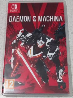 the box art for demon x machina is displayed on a white surface with red and black accents