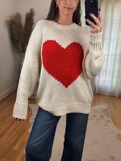 Adorable Oversized Off White Loose Knit Sweater ft. Big Red Heart Detail on Front. A great year round sweater but so adorable for Valentines day! Maclaine is 5'7 wearing a size SMALL. Model is 5’4 wearing a size LARGE. This has a naturally oversized fit! Loose Knit Sweater, Loose Knit Sweaters, Heart Sweater, Loose Knit, Big Heart, Maternity Clothes, Red Heart, Sweater Jacket, Sales Gifts