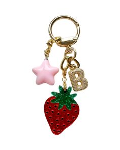 You've likely seen this viral bag charms content all over the internet -- as well as in ELLE, Who What Wear & The Wall Street Journal to name a few. We're excited to introduce this limited-edition STRAWBERRY GIRL KEYCHAIN that is so darling that you will want to attach to all of your precious belongings. Featuring a cutesy strawberry charm and a bubbly pink star charm. Your choice to add a Blingy Bauble initial to level up! So perfect as a personalized gift. Find the other charm options here. A Xmas Gift For Friends, Key Chain Charms, Trendy Accessories 2024, Backpack Keychains Aesthetic, Cute Car Keys Keychains Ideas, Victoria Secret Keychain, Key Chains Aesthetic, Car Keys Keychain Ideas, Cute Bag Charms