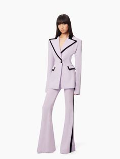 Elevate your wardrobe with our Elegant Lilac Women's Blazer and Pant Suit Set, meticulously designed for the modern woman who appreciates timeless sophistication. This striking suit set features a tailored blazer with a sleek black trim, creating a bold contrast that exudes confidence and style. The blazer's structured shoulders and defined waistline ensure a flattering silhouette, while the matching pants, with their elegant flare and high-quality fabric, offer both comfort and a flawless fit. Contemporary Suits For Women, Female Suits Aesthetic, Pants Suits For Women Chic, Women Suits Business, Coat Set For Women, Suit Outfits For Women, Flared Suit Pants, Hm Clothes, Casual Suit Women