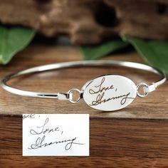 Actual Handwriting Bangle Bracelet, Memorial Bracelet, Sympathy Gift, Personalized Engraved Bracelet, Gift for Her, Signature Bracelet This laser engraved Stainless Steel bangle bracelet is a perfect gift for your Mom, Best Friend or Bride or Bridesmaids! or anyone you choose! Personalized with actual handwriting. This is engraved into high quality heavy gauge stainless steel. Engravable Portion: 15mm x 24mm Stainless Steel does NOT tarnish. How to order: 1. Add this item to your shopping cart 2 Adjustable Signature Style Bracelet For Anniversary, Signature Engraved Bracelet Jewelry, Spiritual Engraved Bracelets For Friendship, Engraved Friendship Bracelet Jewelry, Engraved Adjustable Oval Bracelets, Spiritual Engraved Bracelet For Friendship, Adjustable Symbolic Jewelry With Engraving Option, Adjustable Oval Engraved Bracelets, Engraved Bangle Jewelry As A Gift