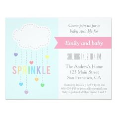 a pink and blue baby shower card with a cloud hanging from it's side