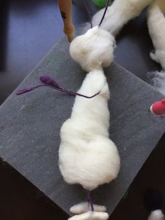 the yarn is being made to look like a caterpillar