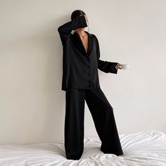 Sleep in luxurious comfort with Hiloc Oversized Satin Silk Sleepwear, boasting a flattering low-cut design and single-breasted long sleeves. Delicate yet sensuous satin silk fabric gently caresses your skin for a blissful night's sleep. Feel chic and beautiful as you lounge in its breathtakingly stylish wide-leg pants. A perfect companion for a blissful night's rest. Pijamas Women, Pyjama Satin, Wide Leg Pant Suit, Outfit Classy, Pajamas For Women, Silk Sleepwear, Silk Pajama Set, Long Sleeve Tops Casual, Sleepwear Sets