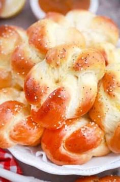 hot cross buns on a plate with salt sprinkled on them