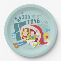 a paper plate with an image of toy story characters on it