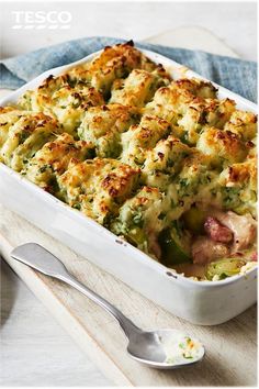 a casserole dish with meat and vegetables in it