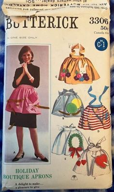 1965 Butterick pattern 3306 for corny holiday aprons, one size fits all.  I recognize Easter, July 4th, Christmas, Valentine's Day, I'm not sure what the balloons and View A are about - sorry.  Pattern is factory folded, envelope as pictured ( please note the petrified rubber band adhered to the front).  Comes from a clean environment. Holiday Aprons Vintage, Half Apron Patterns, Vintage Apron Pattern, Sewing Men, Holiday Aprons, Patron Vintage, Holiday Boutique, Hostess Apron, Apron Sewing Pattern