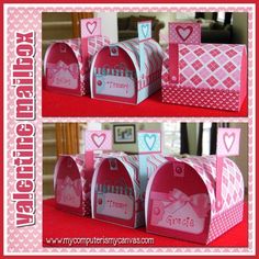 some pink and white mail boxes with hearts on them