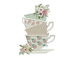 a stack of tea cups filled with flowers