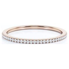 a rose gold wedding band with white diamonds