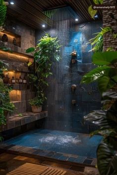 an indoor shower with plants in the corner