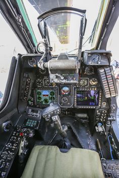 the cockpit of an airplane with multiple controls