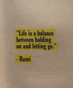 a piece of paper that has some type of text on it with the words life is a balance between holding on and letting go rumi