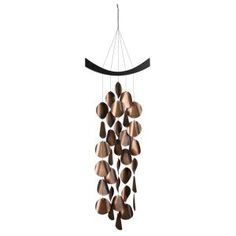 a wind chime hanging from the ceiling with lots of shells on it's side