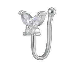 a pair of silver nose rings with crystal stones on each end and a butterfly design in the middle