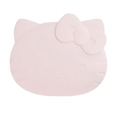 a pink hello kitty shaped plate on a white background