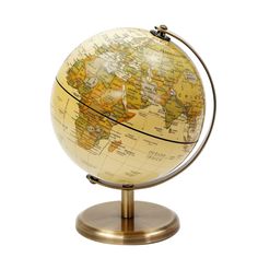 an illuminated globe on a metal stand with a white back ground and yellow map in the middle