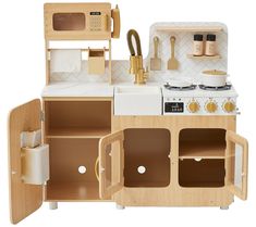 a wooden toy kitchen with white appliances and wood accessories on the counter top, including a sink, stove, oven, toaster and dishwasher