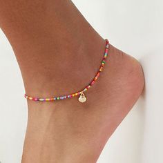 We give you our first anklet collection for this season. Our best selling choker now is an anklet! Beautiful and fun Sterling Silver anklets! This anklet is made with red, black, yellow, orange, teal, and gold seed beads. It is finished with a lobster claw clasp. These waterproof Anklets are a perfect addition to your jewelry collection, beach weddings, bachelorette parties, girl's weekends, and to charm your boyfriend 😉 To find your size, measure your anklet with a string then lay on a ruler to determine your size. The most comfortable fit is just below the ankle bone although many women like the higher look as well! We use only the highest quality materials, Italian sterling silver or Italian Sterling Silver with a heavy 18K gold layer. Length of anklet: 12 inches Extender : up to 3 inc Pulseras Kandi, Leg Jewelry, Anklets For Women, Beaded Ankle Bracelets, Metaphysical Jewelry, Barefoot Sandal, Beaded Ankle, Ankle Jewelry, Anklets Boho