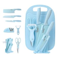 a set of kitchen utensils in a blue case with scissors and shears