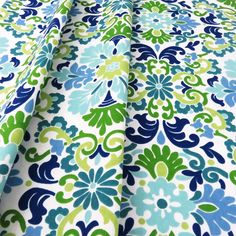 a blue and green floral print fabric