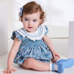 Botanical blues, ready for Spring. Our Botanical Print Romper is a signature print this season. The traditional sleeveless silhouette is perfect to keep your little ones cool during the warmer months, and has intricate details for statement finishing touches, including the oversized frill collar and delicate handsmocking across the chest. Available from 3M – 18M. #onlypepa #traditionalchildrenswear Baby Pictures, Couture, Frill Collar, A Signature, Signature Print, Printed Rompers, Botanical Print, Girls Fashion