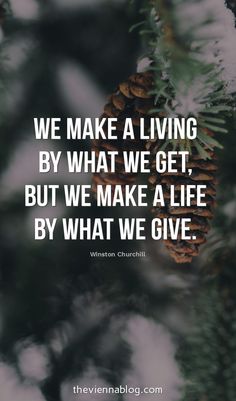 a pine cone hanging from a tree with the quote we make a living by what we get, but we make a life by what we give