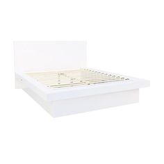 a white bed frame with no sheets on it