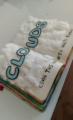 a stack of books sitting on top of a table