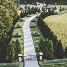 an artist's rendering of a driveway leading to a large house in the distance