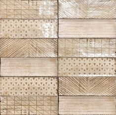 an abstract pattern made up of squares and strips of woven fabric, in beige tones