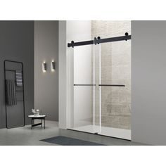 an image of a bathroom scene with focus on the shower door and glass partitions