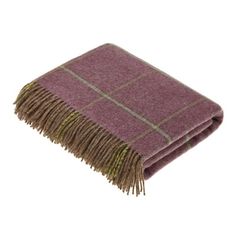 a purple and green plaid blanket with fringes