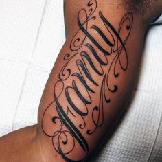 a man with a name tattoo on his arm