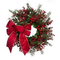 a christmas wreath with red berries and greenery