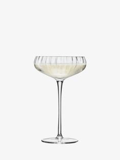 an empty wine glass on a white background