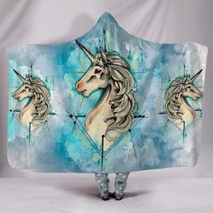 a hooded blanket with two unicorns on it