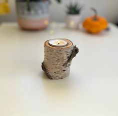 a candle that is sitting on top of a table