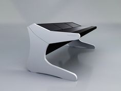 a futuristic computer desk with a solar panel on it's top and bottom edge