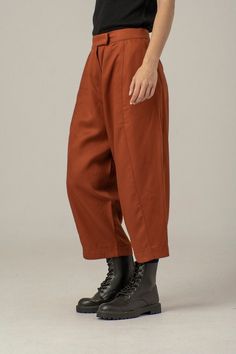 "Burnt Orange Boyfriend Pants, Wide Baggy Pants, Women Trousers ABOUT THE PANTS: Pants with side pockets and comfortable loose cut. Closure with button and zipper. They fit perfectly different body shapes. They are comfy and stylish for an everyday city look. *CARE* - Hand wash in cold water/ Dry Cleaning - Machine 30oC *COLORS* Please, always remember that colors of images may look a bit different because of the specifics of your monitor's settings. Model is wearing size M. She is 5'9\"/170 cm Baggy High Waisted Pants, Dark Orange Pants Outfit, Orange Baggy Trousers, Rust Trousers Outfit, Burnt Orange Pants Outfit, Rust Pants Outfit, Wide Baggy Pants, High Water Pants, Burnt Orange Pants