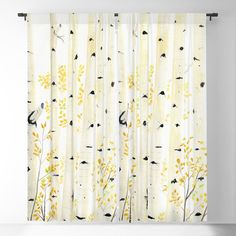 a curtain with yellow and black trees on it