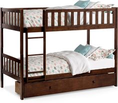 a wooden bunk bed with white sheets and blue pillows