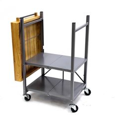 a metal cart with a wooden door on wheels