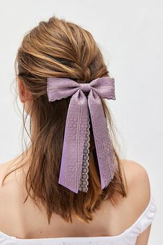 Dolly satin lace hair bow barrette. Lacey satin hair bow complete with a secure clip. Features Dolly satin lace hair bow barrette Lacey satin hair bow clip Content + Care Textile, mixed metal Spot clean Imported | Dolly Satin Lace Hair Bow Barrette in Purple Dove, Women's at Urban Outfitters Lavender Hair, Lavender Hair Accessories, Lace Hair Bow, Satin Hair Bow, Bow Barrette, Hair Bow Clip, Bow Clip, Lace Hair, Bow Hair Clips