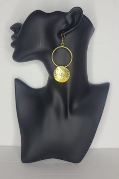 These earrings are hand crafted from brass material, which makes them a show stopper in the way they catch the light. They are bond to add some excitement to any outfit. Get a pair for yourself or as a gift to someone you love for special occasion or just because.  Details: - hand made - light weight - materials : brass - hook closure - clear rubber stopper Gold Brass Plug Earrings For Wedding, Nickel-free Round Earrings For Party, Nickel Free Round Earrings For Party, Handmade Brass Dangle Chandelier Earrings, Handmade Brass Chandelier Dangle Earrings, Gold Copper Chandelier Earrings, Gold Hoop Earrings With Pierced Copper, Brass Pierced Hoop Earrings For Party, Gold Brass Hoop Earrings For Wedding